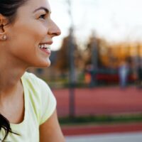 Beautiful female jogger tired after running Beautiful female jogger tired after running